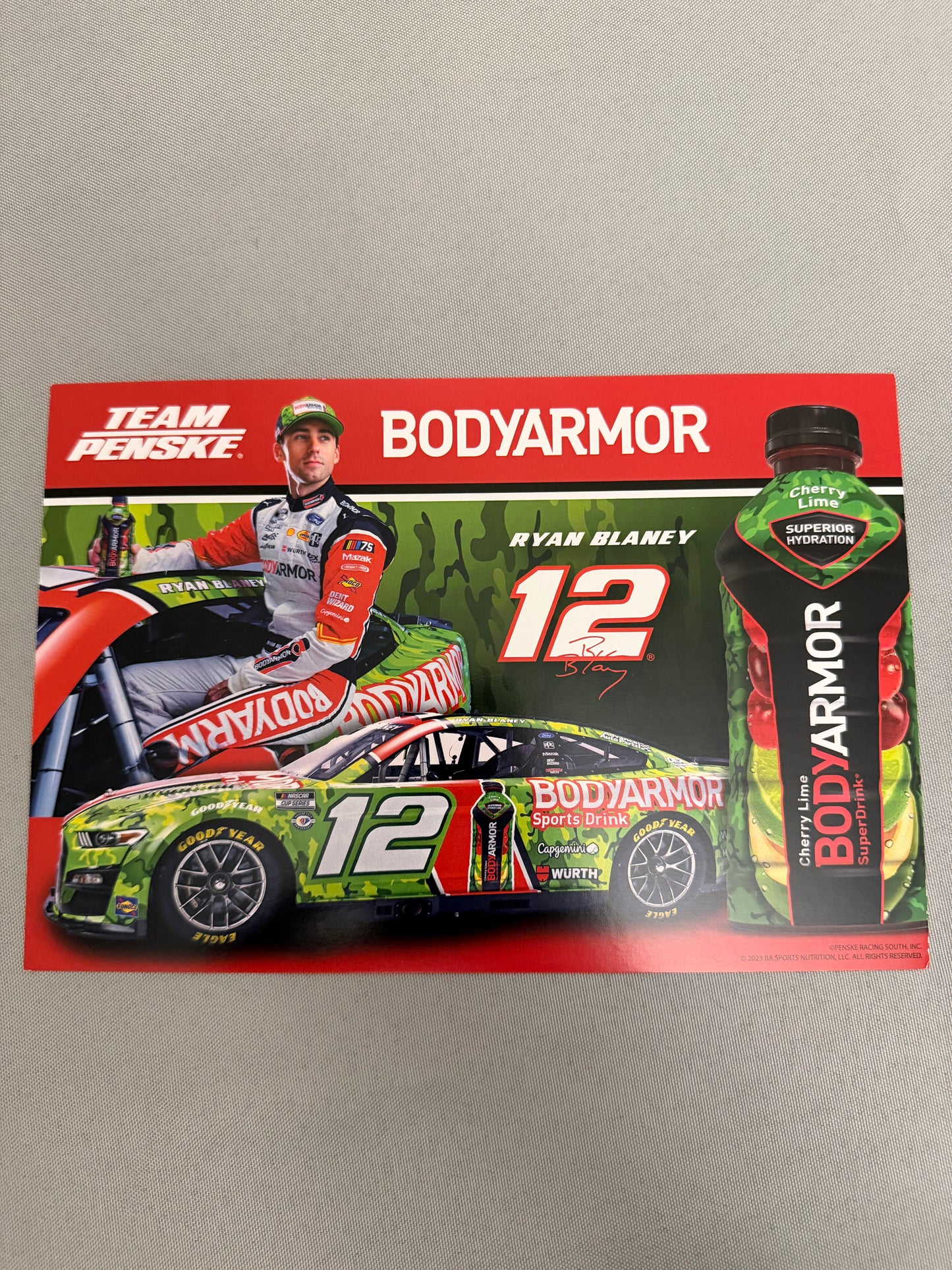 Ryan Blaney #12 2023 Coke 600 Body Armor Camo Nascar Hero Card