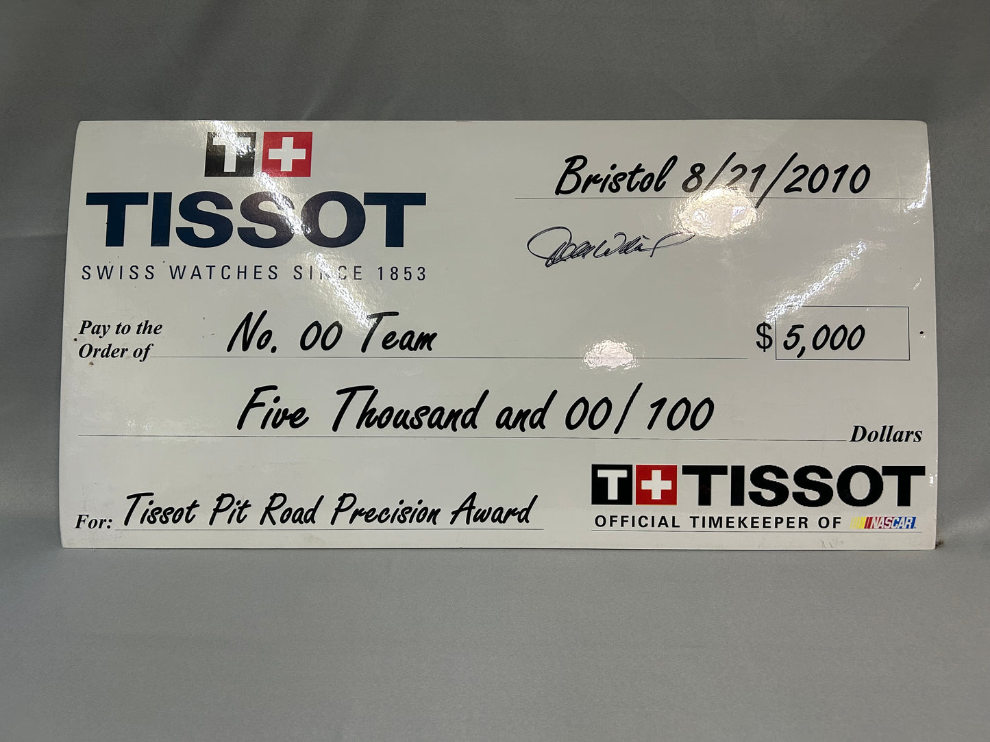 David Reutimann #00 2010 Bristol Tissot Pit Road Precision Nascar Check